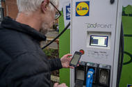 Man using Lidl electric car charger 2021