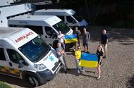 Ukraine ambulance feature volunteers with Ukraine flag