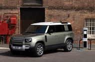land rover defender p400e charging front quarter static