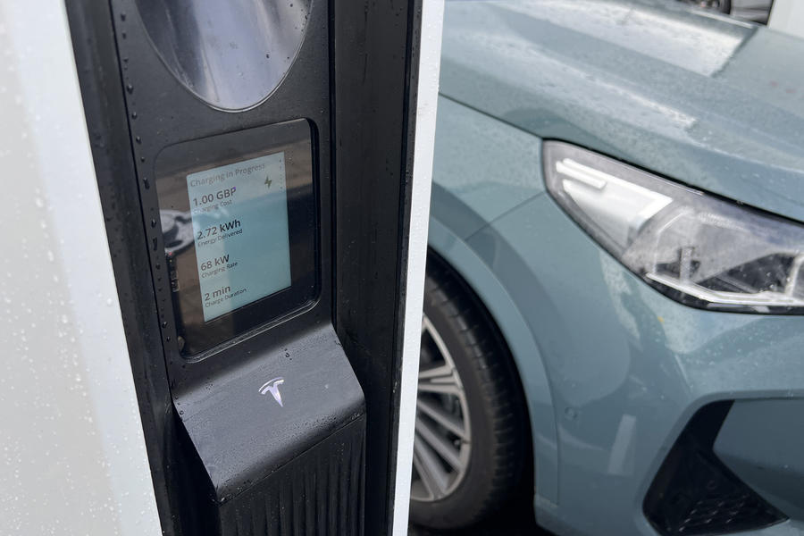 Autocar's BMW iX1 plugged into a Tesla V4 Supercharger