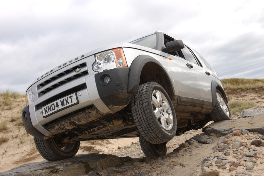 Land Rover Discovery 3 climbing over rocks