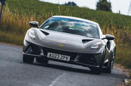 lotus emira 4 cylinder 2023 review 01 cornering front