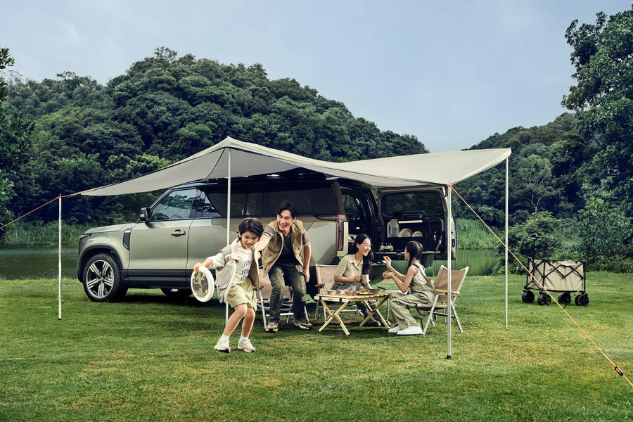 Polestones 01 rear with gazebo popped out and family having tea