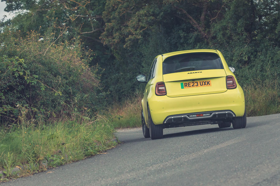 Abarth 500e rear quarter entering corner