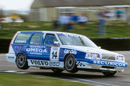 Volvo 850 BTCC racer cornering on two wheels