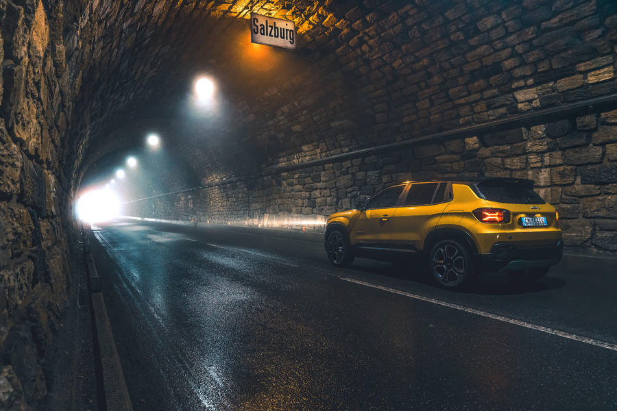 Jeep Avenger driving through tunnel in Austria – rear quarter