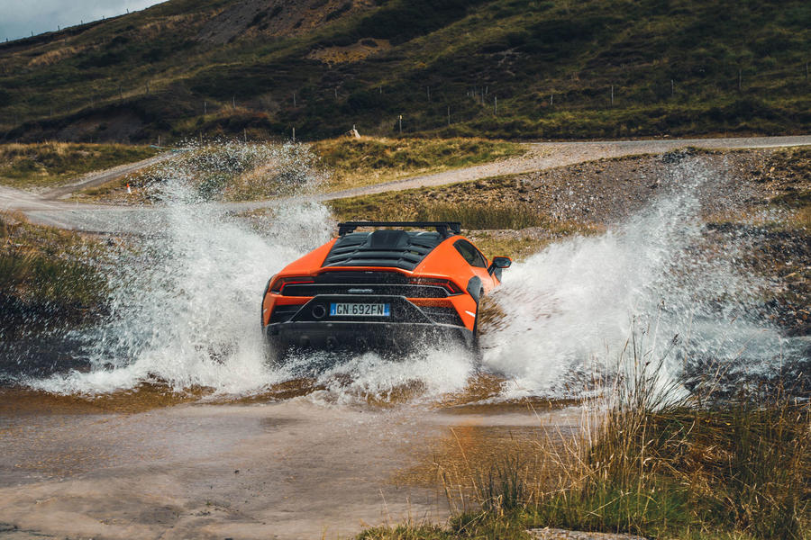 Lamborghini Huracan Sterrato driving through water – rear