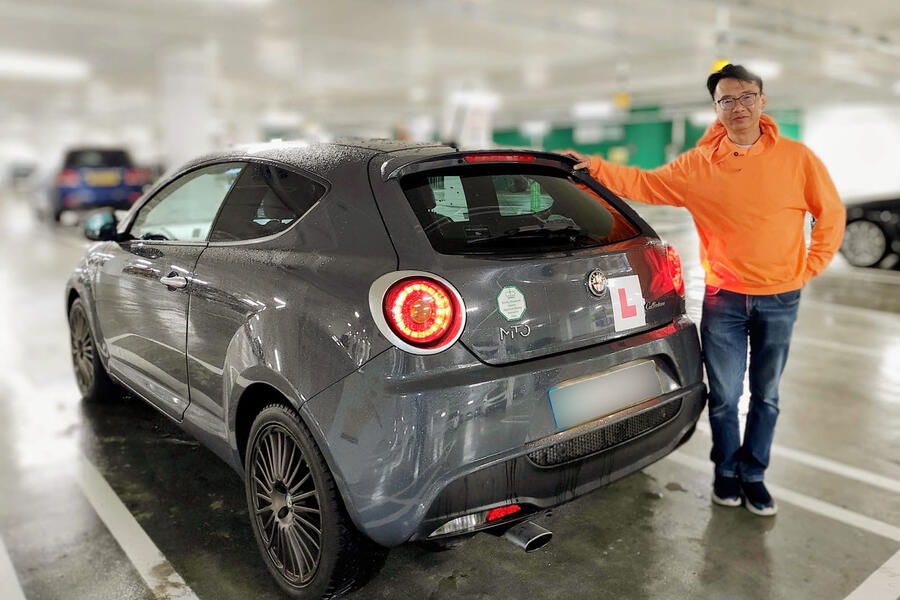 Driving instructor Ricky Tang with his Alfa Romeo Mito