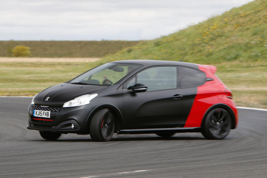 Peugeot 208 GTI oversteering through a bend