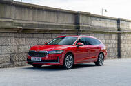 Red Skoda Superb estate static front 3/4 shot